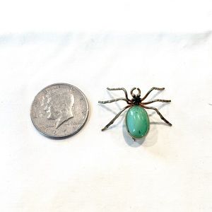 Brass and jade spider brooch